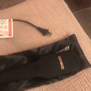 Amika hair brush straightener